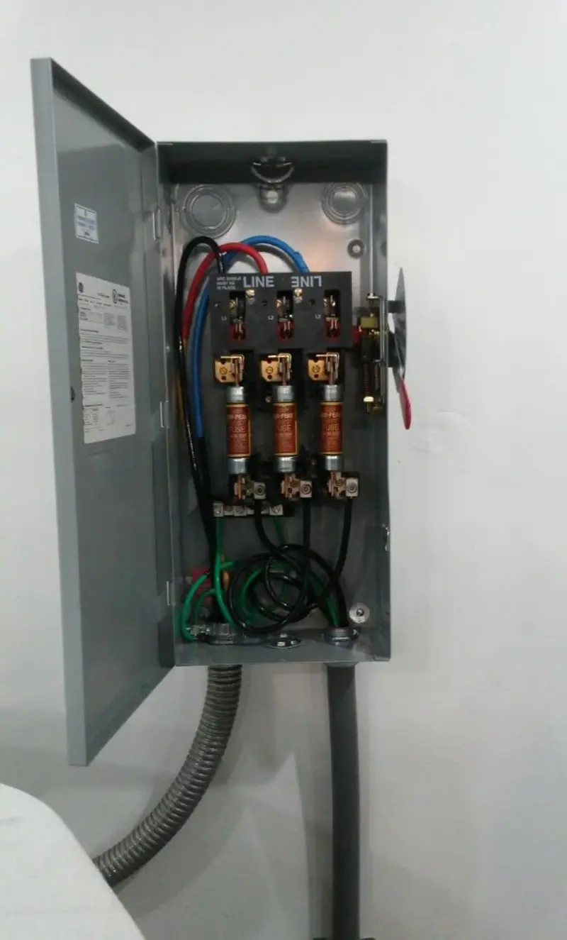Three-phase disconnect switch installed for Smoke Detector Installation in Peppermill Village
